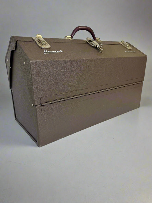 Brown Homak toolbox with a handle on a gray background homak 22 inch heavy duty cantilever toolbox
