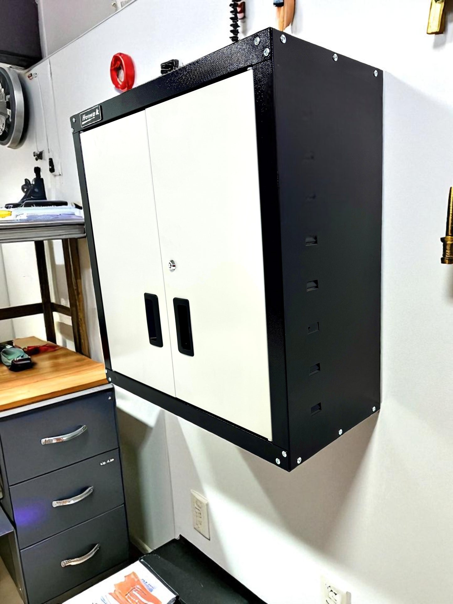 Steel garage wall cabinet with adjustable shelves